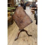 An early 19th Century mahogany tilt top table