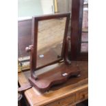 A late Victorian swing toilet mirror