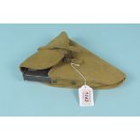 A WWII Canadian 'Browning 9mm hi-power' holster dated 1944 with magazine,