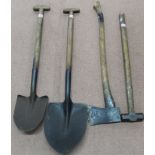Two WWII era shovels with an axe and a sledgehammer