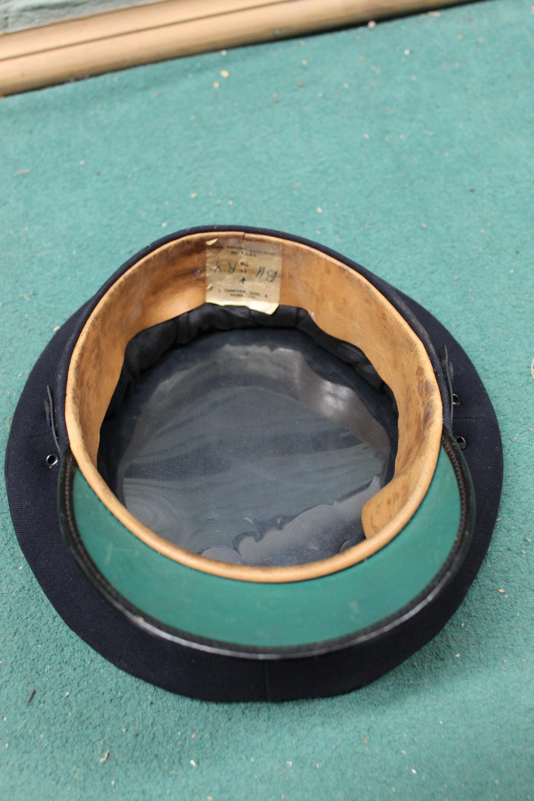 A fireman's axe within webbing belt and a cap bearing Lancashire County Brigade insignia - Image 2 of 3