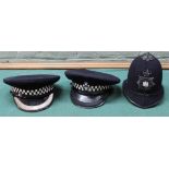 A Police helmet with Cambridge City Police insignia plus a Mid-Anglia Constabulary cap with a