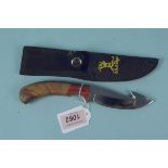 An 'Elk Ridge' hunting/skinning knife with sheath