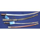 Two 'Indian' sabres with scabbards