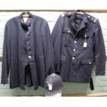 Two Police jackets with a Police helmet,