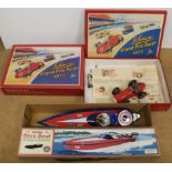 A later produced Schuco Grand Prix racer set 1075 plus a later Schylling race boat