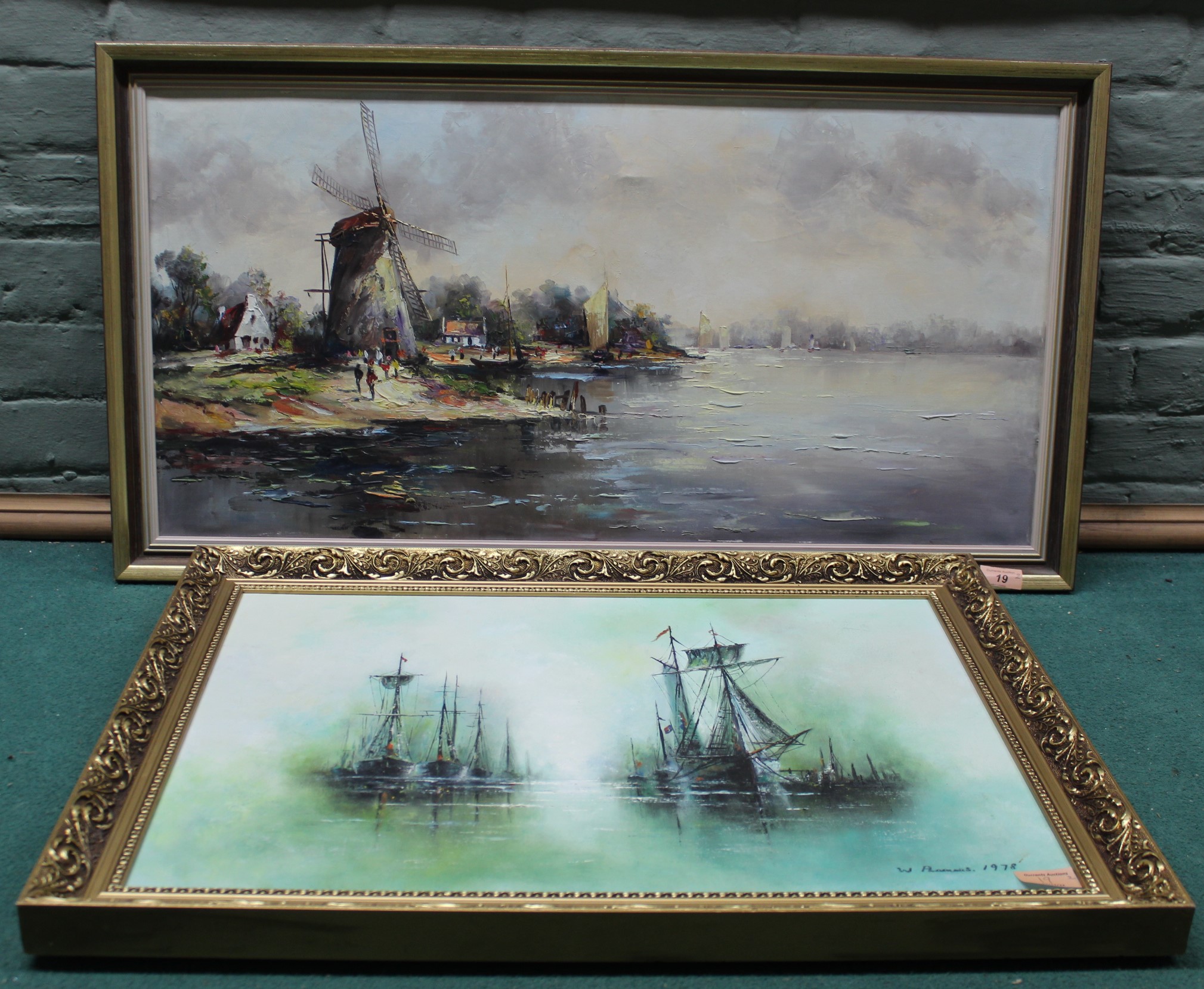 A 20th Century framed oil on canvas of sailing ships at anchor plus a framed oil of a river scene