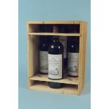 Four bottles of Chateau Laroque Grand Cru Classe 2005 red wine