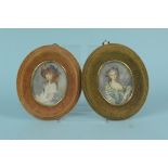 A pair of hand painted picture miniatures of ladies in early 19th Century costume,