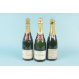 Two bottles of Moet & Chandon champagne plus a bottle of De Clairveaux champagne