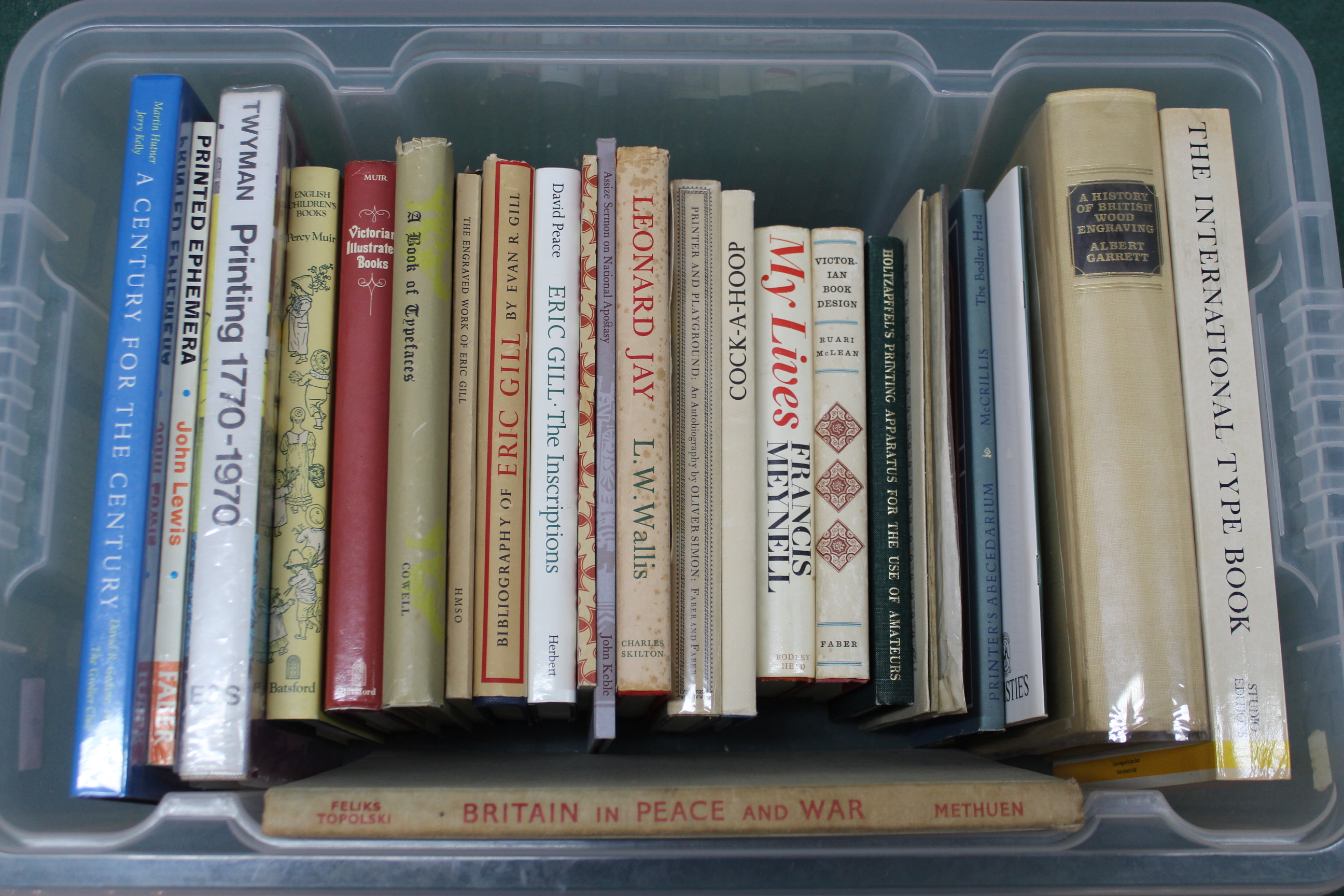 A box of books, subjects including printing, design,