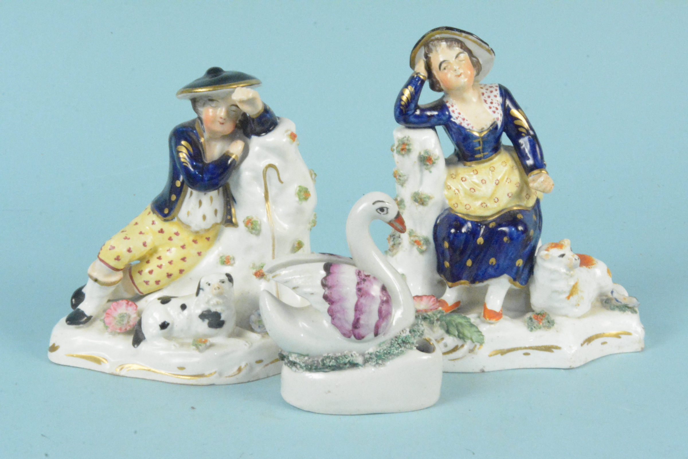 A pair of Staffordshire figures,