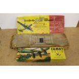 Three vintage airplane model kits including 'Strombecker' B-29 Boeing Superfortress (appears