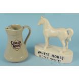 A vintage Kelsboro pottery White Horse scotch whisky horse figurine plus a Wade Queen Anne scotch