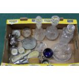 Three cut glass decanters with stoppers and one other,