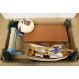 A box of mixed toys including a metal childs mangle, wooden sail boat,