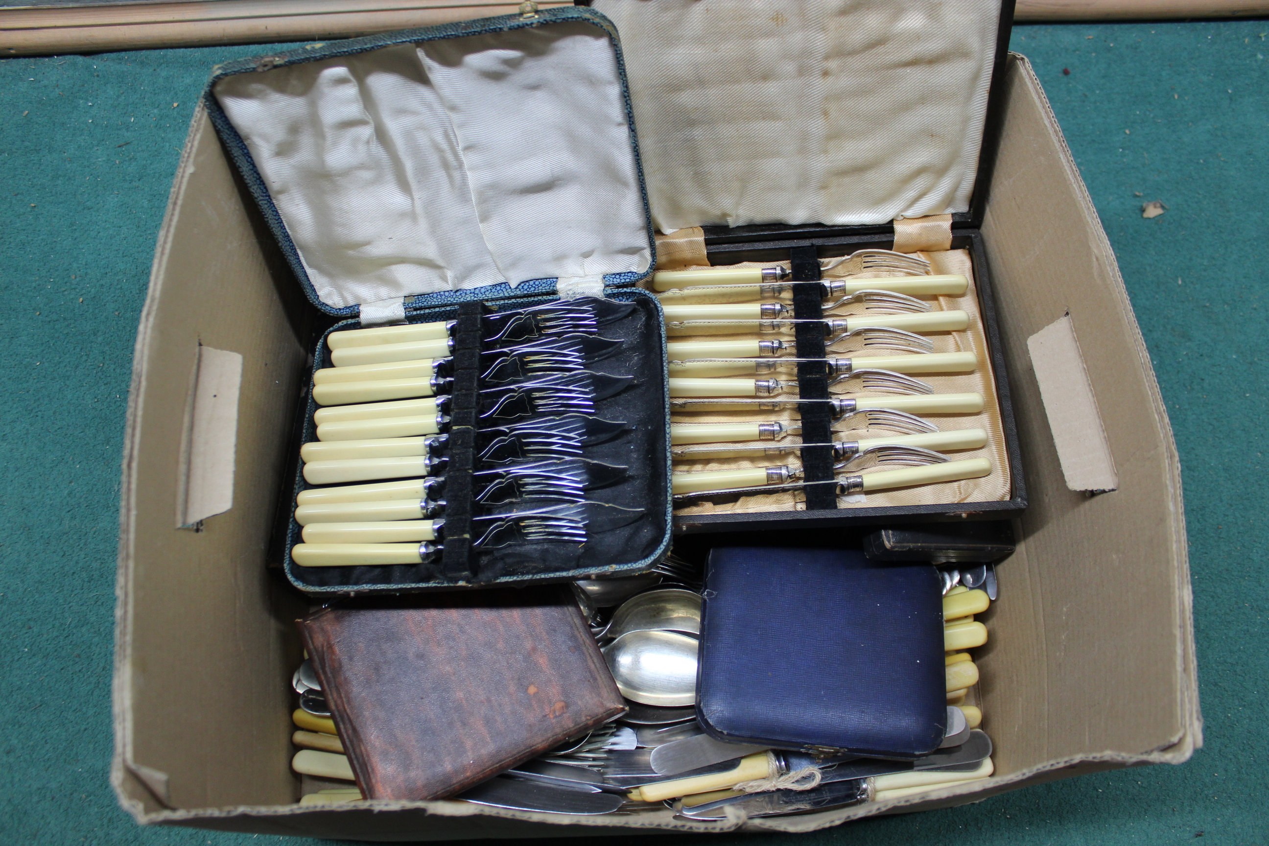 A quantity of mixed plated cutlery plus seven cased sets of plated teaspoons, coffee spoons,