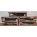 Two boxed Lima train engines,