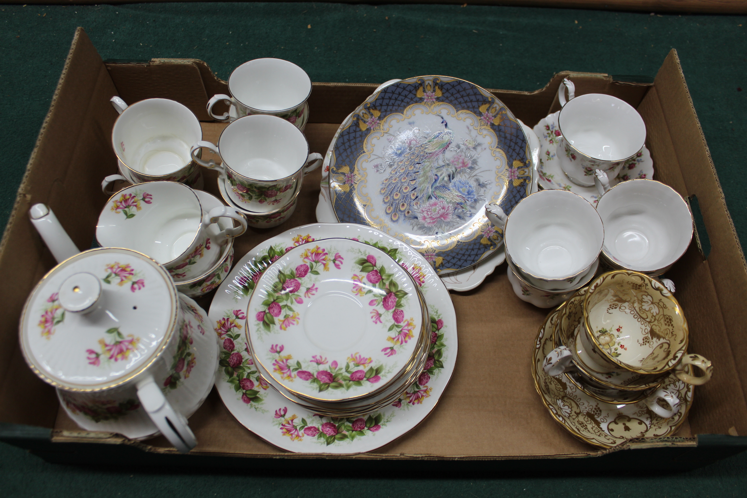 Royal Albert 'Winsome' pattern five cups and saucers plus a Queens 'Woman and Home' tea set (one