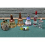 Two bottles of vodka, a Wade Bells 2000 Queen mum whisky, a Wade Bells decanter,