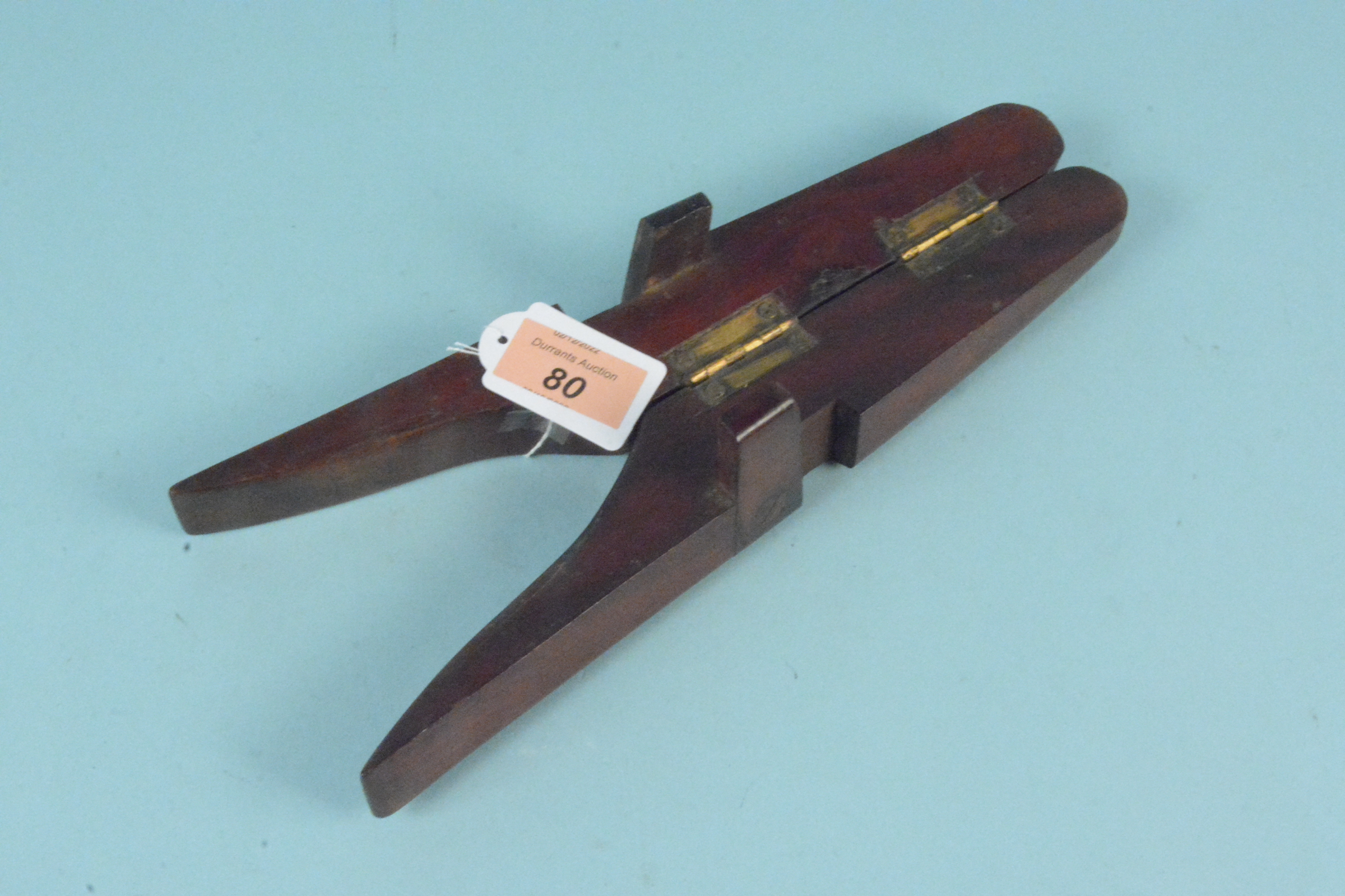 A 19th Century folding mahogany boot jack,