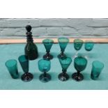 A selection of Victorian green glass including a small decanter plus various drinking glasses