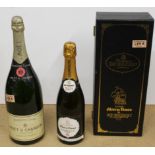 A 150cl Moet and Chandon Premiere Cuvee champagne plus a cased bottle of Mary Rose de Courcy
