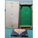 A Kay of London bagatelle board plus a boxed Magic Tricks set (contents disturbed)