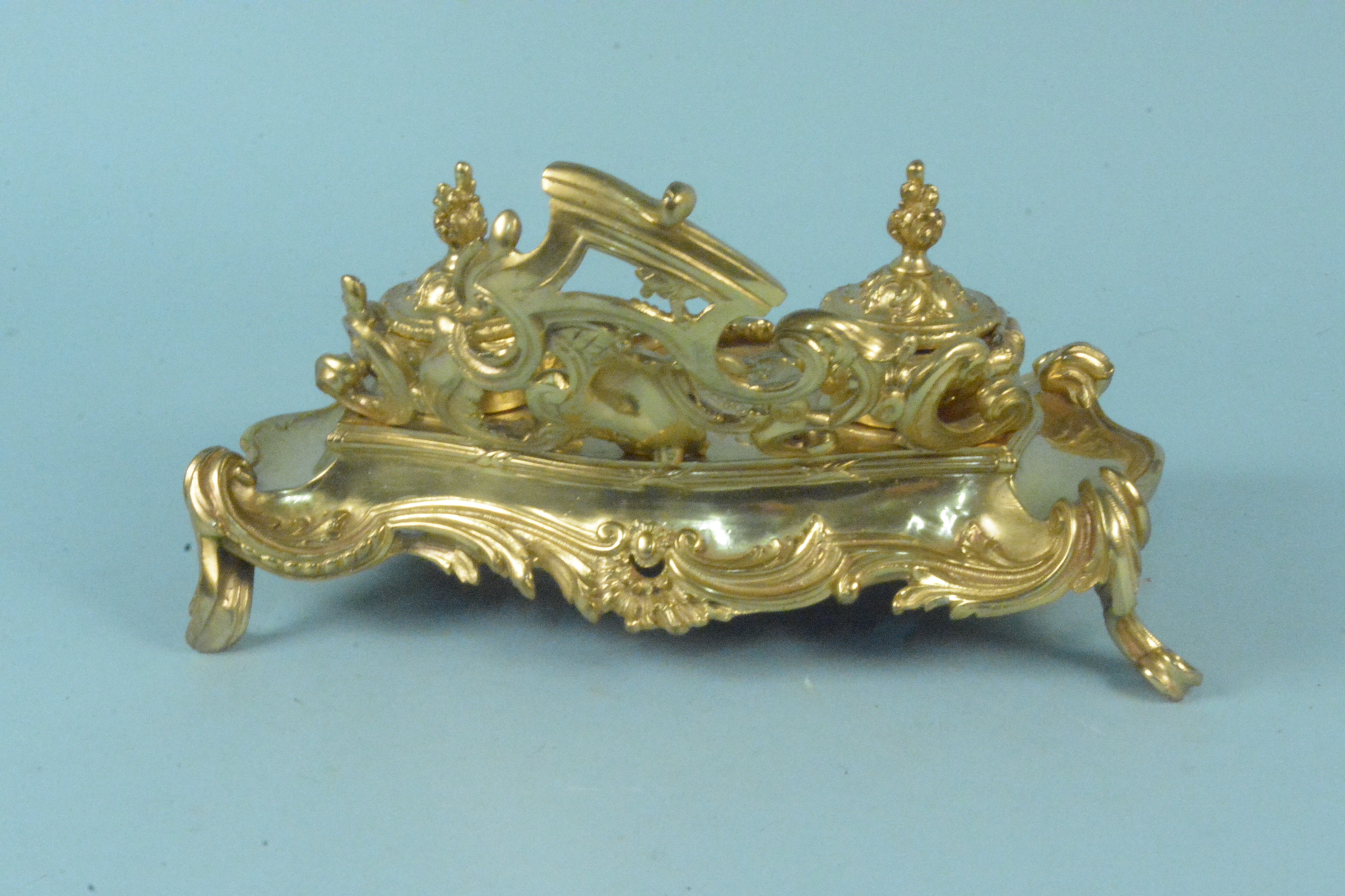 A late 19th Century continental gilt brass inkstand of Rococo design with two lidded inkwells, - Image 3 of 3