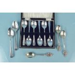 A cased set of six silver teaspoons together with various other silver spoons,