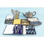 A cased silver mounted manicure set including buffer and lidded glass jar plus two cased sets of