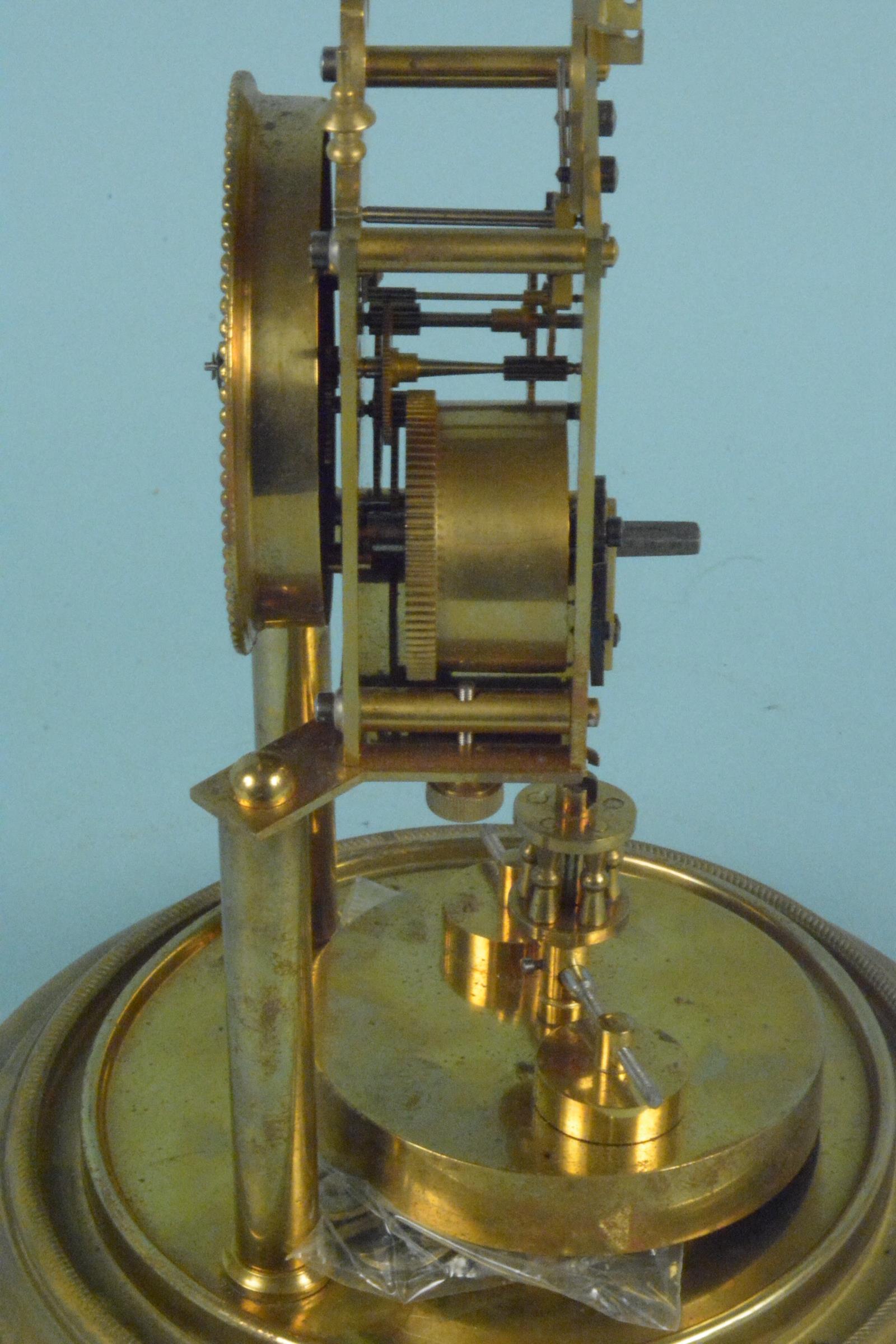 A brass torsion clock under glass dome - Image 2 of 3