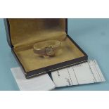 A lady's Longines 9ct gold wristwatch in original box with receipt