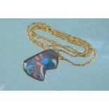An 18ct gold mounted opal triplet pendant with brooch fitting on 18ct gold necklace,