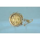 A 1902 half sovereign in 9ct gold brooch mount,