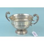 A silver twin handled presentation bowl (uninscribed) hallmarked Sheffield 1924,