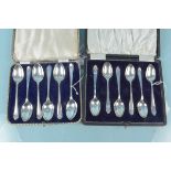 Two sets of six silver teaspoons, both cased and one with golf decoration,