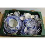 A box of assorted blue and white china including plates, jugs,