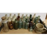 A selection of vintage stoneware and glass medicine bottles etc