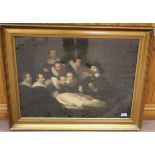A framed print in swept gilt frame after 'A Lesson in Anatomy' by Rembrandt, 54.5cm x 72.