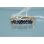 A 9ct gold blue stone set ring, size L, weight approx 1.