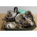 A box of assorted plated ware including a teapot, a pair of dishes,
