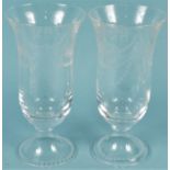A pair of etched glass vases