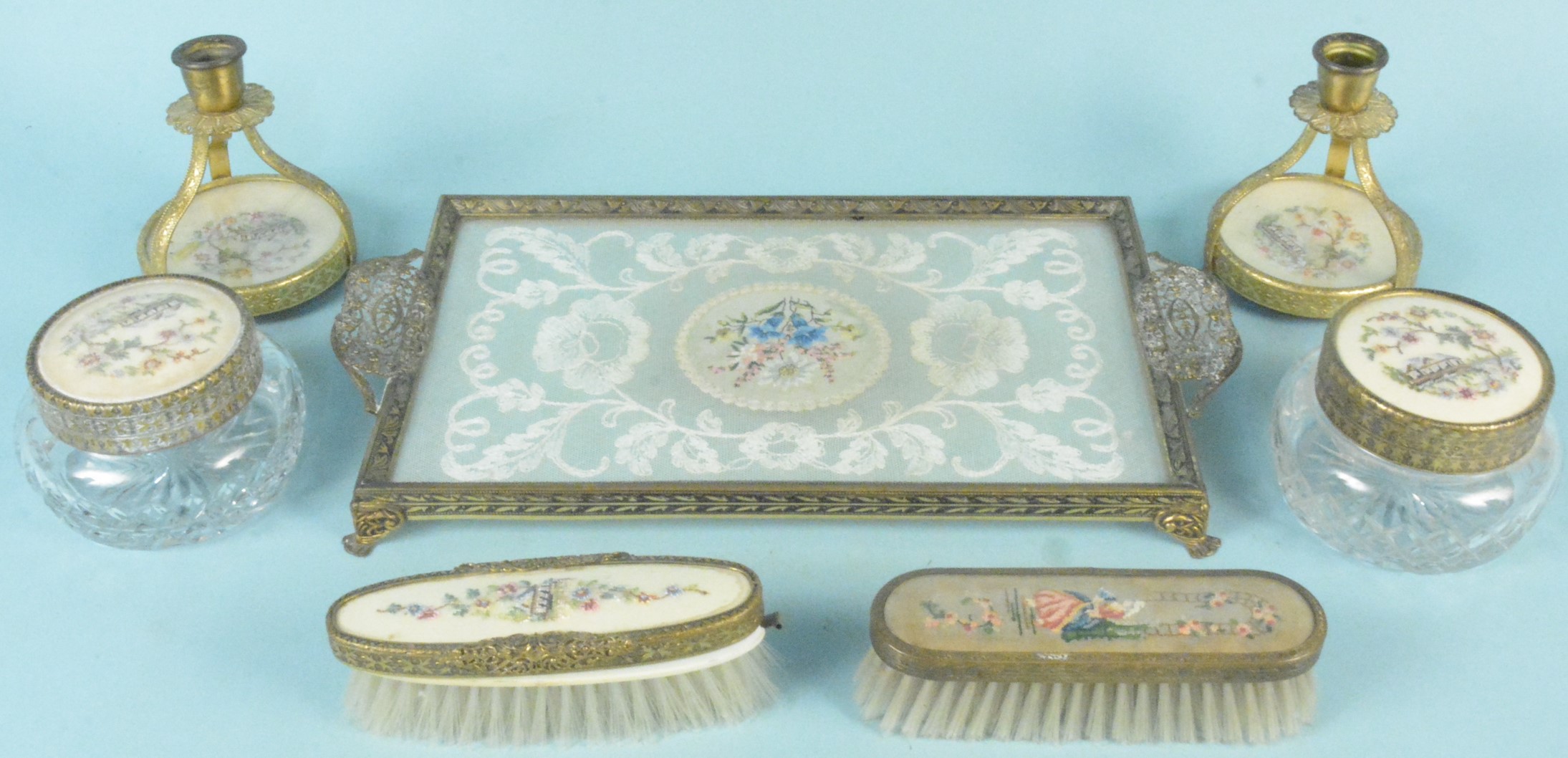 A vintage lace inlaid dressing table set with cut glass powder pots with embroidered inserts (as