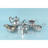 A selection of silver plated items including a tea canister,