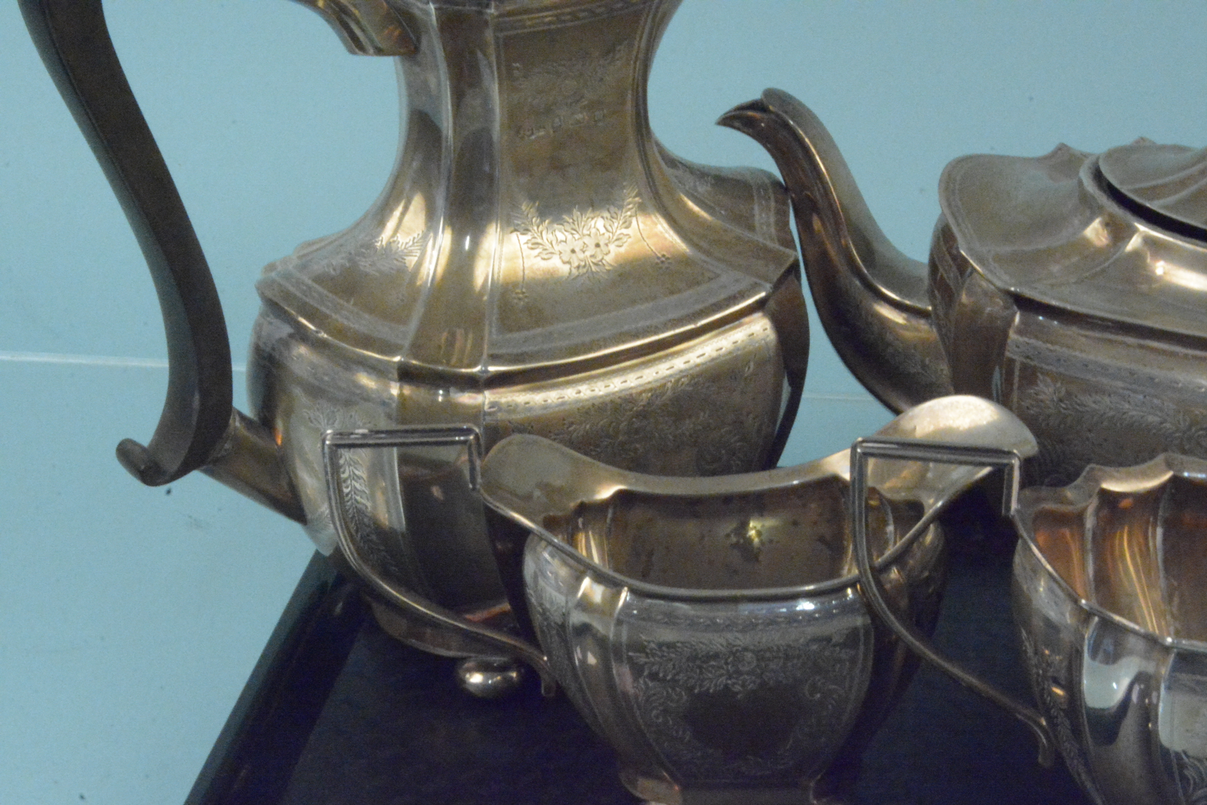 A four piece silver tea set with ornate engraved floral decoration, hallmarked Birmingham 1911, - Image 2 of 3