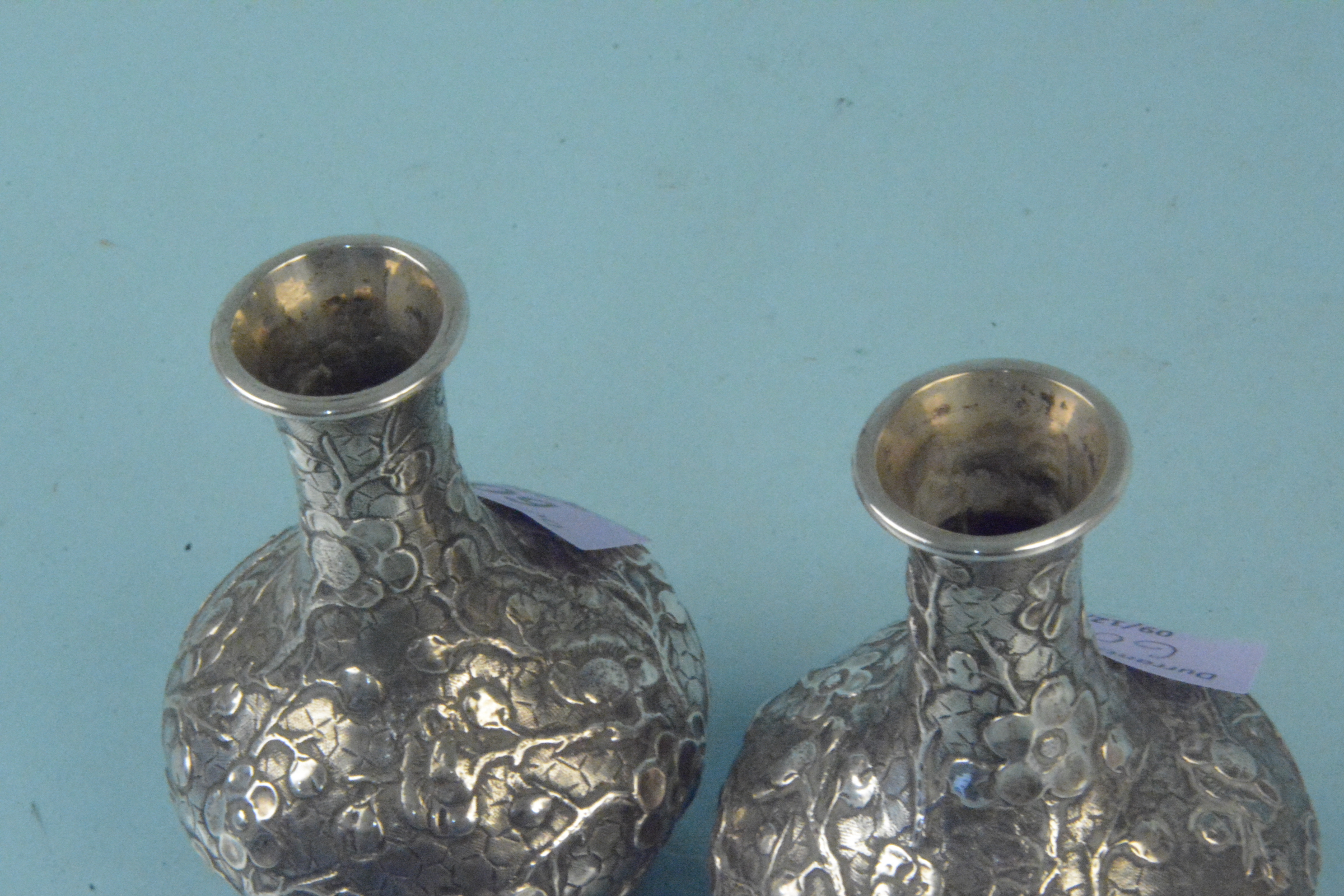 A pair of Chinese silver bud vases with embossed floral decoration, - Image 2 of 3