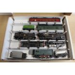 A box with two layers containing various Hornby locos and engines including 'Silver King',