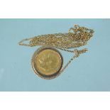 A 1912 sovereign in 9ct gold rope twist mount on yellow metal chain, clasp marked 10ct,