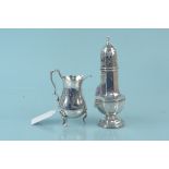 A silver sugar sifter (as found) plus a silver cream jug (as found), both hallmarked Chester 1906,